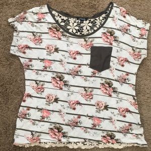 Floral blouse with somewhat open floral backside